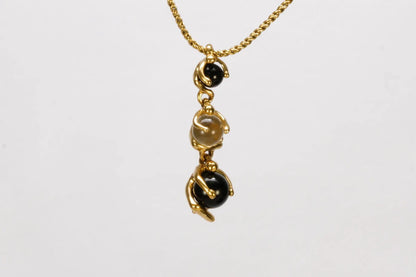 Collier JOURDAN en Plaqué Or avec pierres rondes noires et blanches Ma boutique