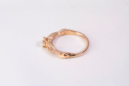 Solitaire Accompagné en Or Rose 18k et Diamants